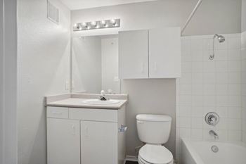 White tile shower / tub combo